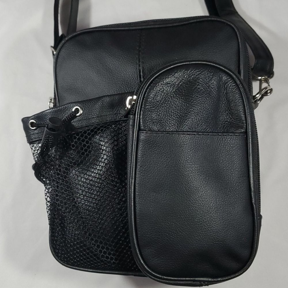 Leather travel all : phone and water bottle.